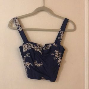 Crop top tank with floral accent